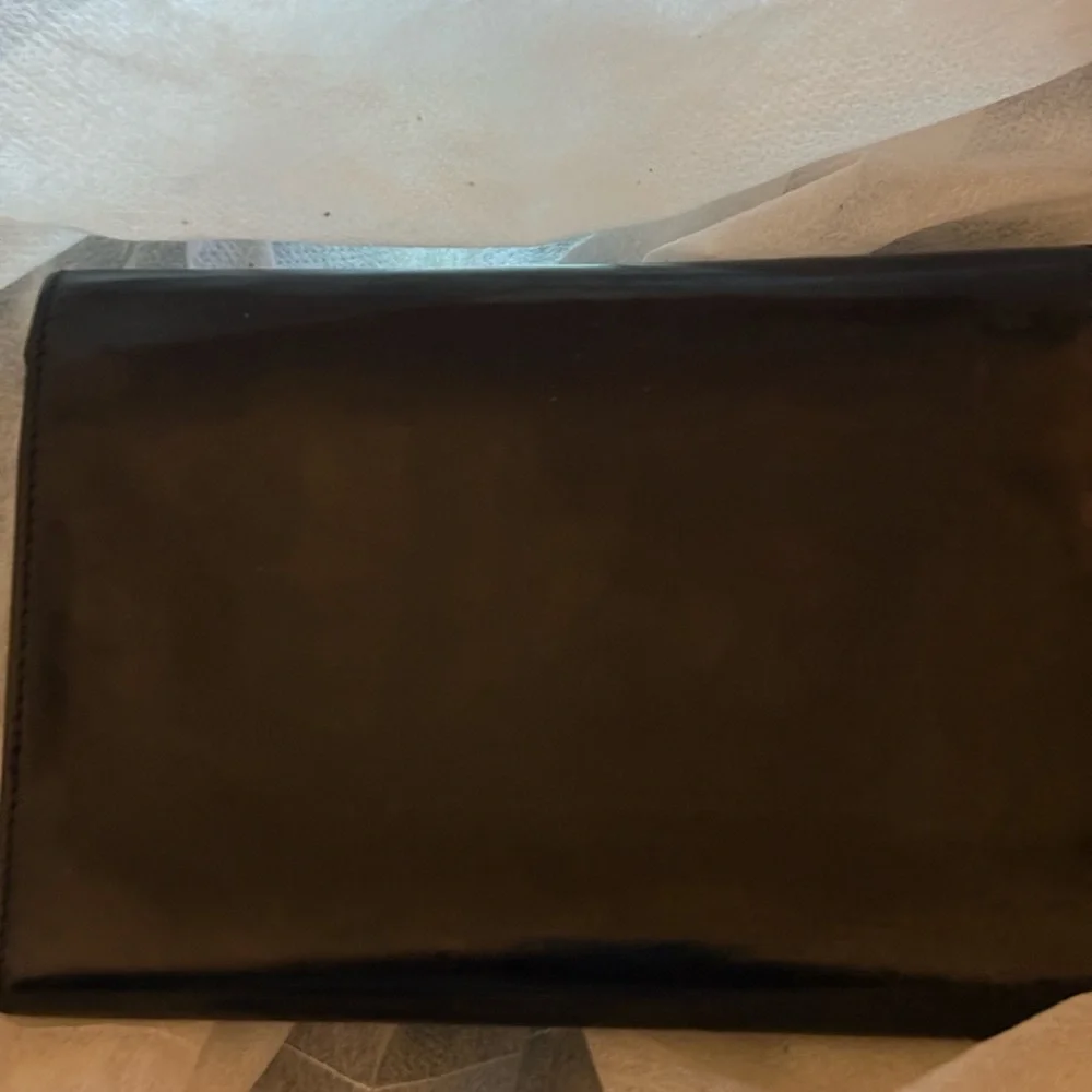 Prada Black Leather Wallet with‎ Minimalist Design